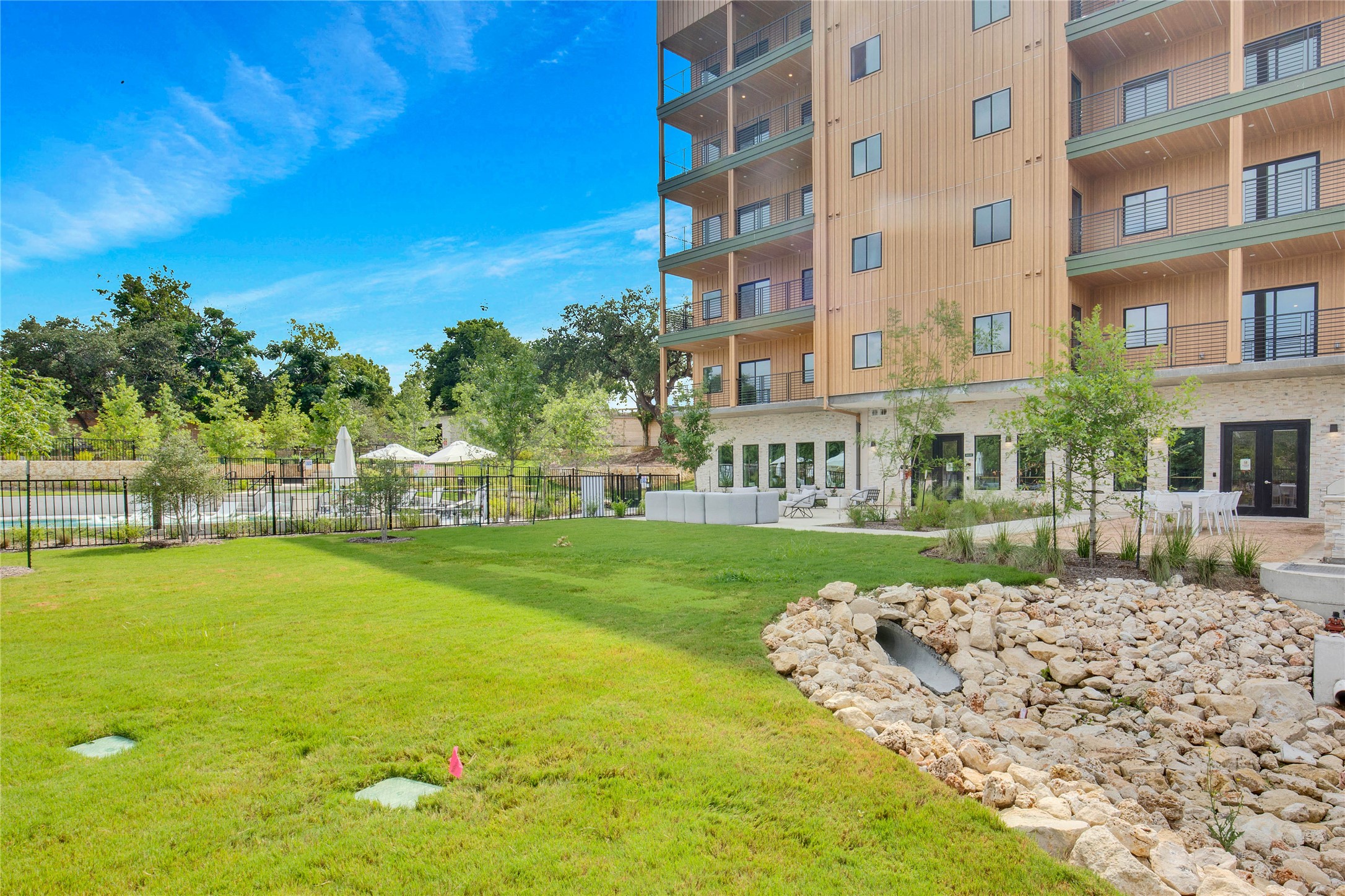 4802 South Congress Avenue, Unit 407 Austin, TX 78745 - Photo 23 of 25 a view of a house with a yard