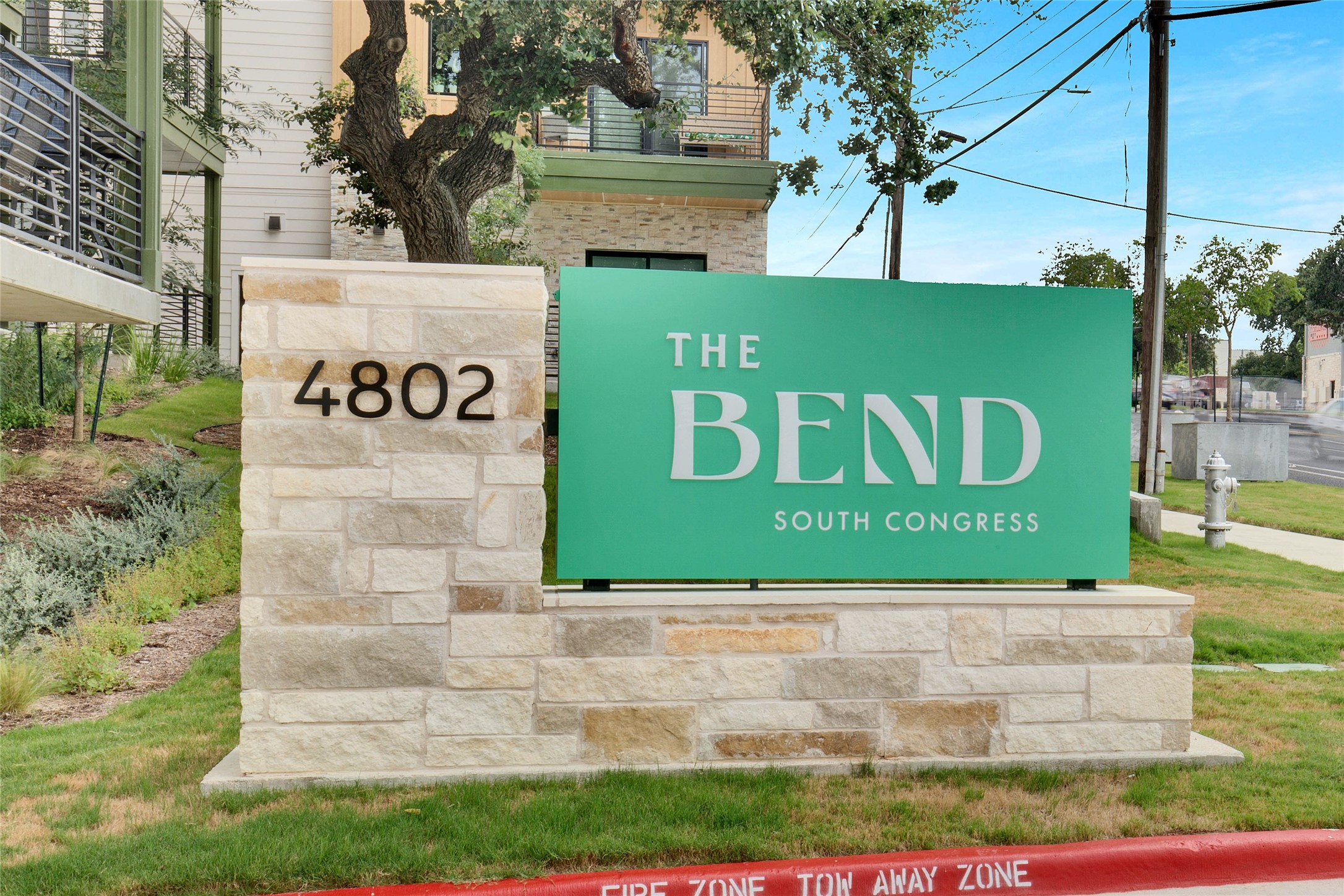 4802 South Congress Avenue, Unit 407 Austin, TX 78745 - Photo 24 of 25 a sign that is on the side of a building