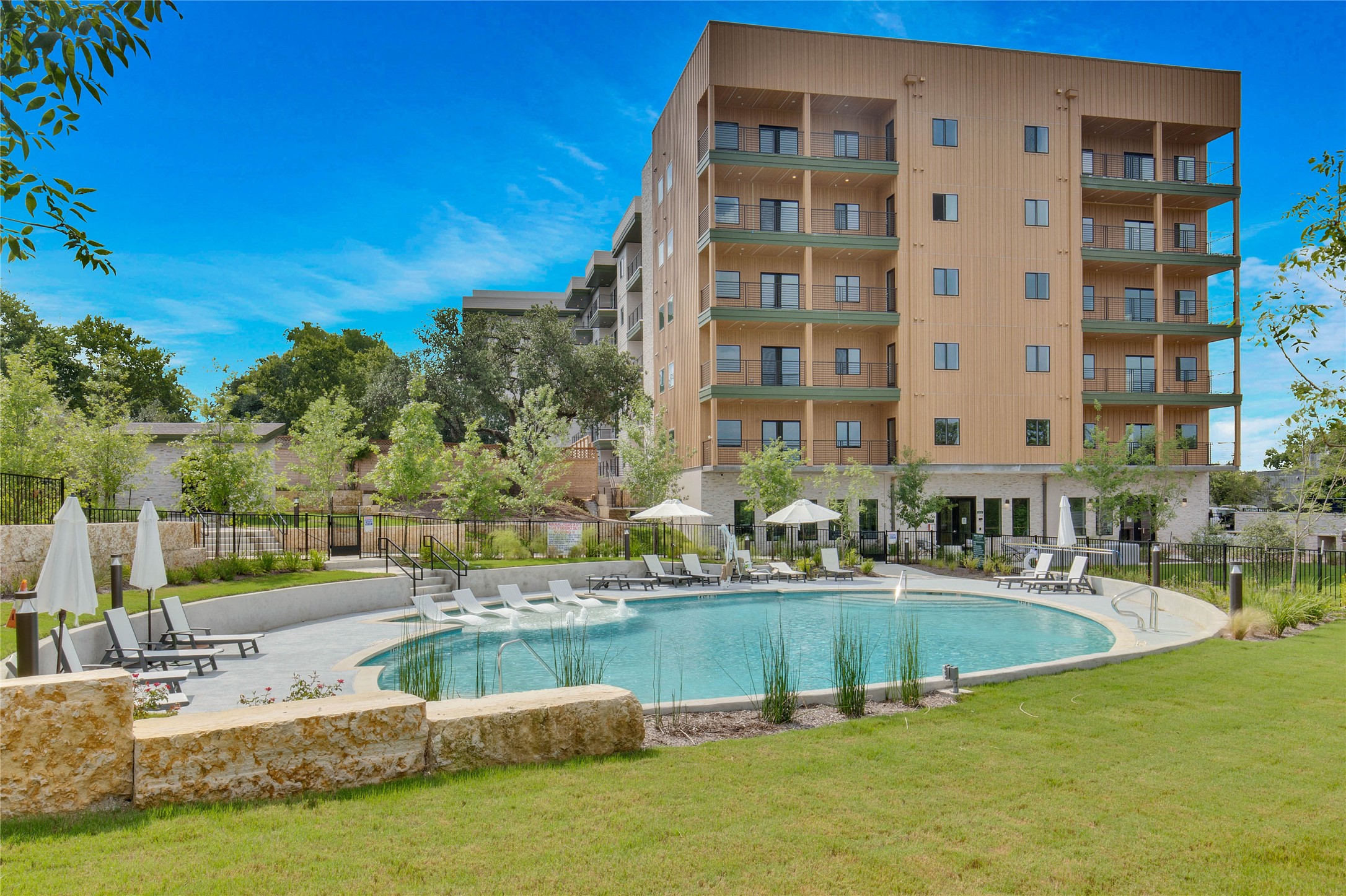 4802 South Congress Avenue, Unit 407 Austin, TX 78745 - Photo 4 of 25 a view of swimming pool with outdoor seating and yard