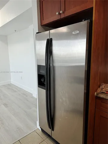 a close view of a refrigerator in kitchen