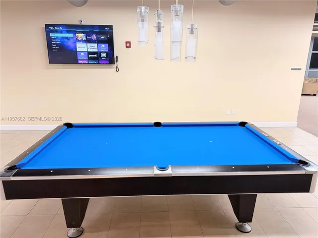 a close up of a wall with a projector screen