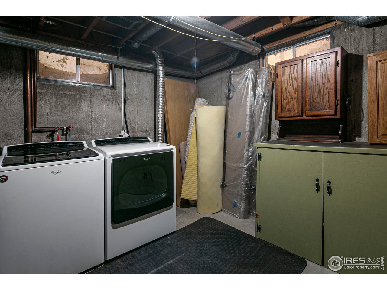 3415 West 5th St Road Greeley, CO 80634 - Photo 22 of 27 a utility room with dryer and washer