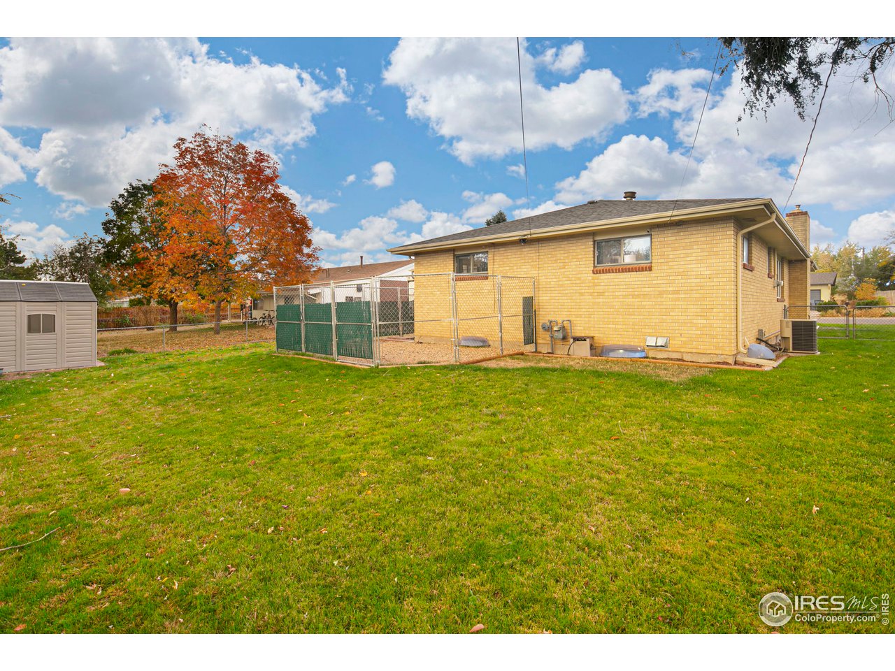 3415 West 5th St Road Greeley, CO 80634 - Photo 25 of 27 a view of a house with a yard