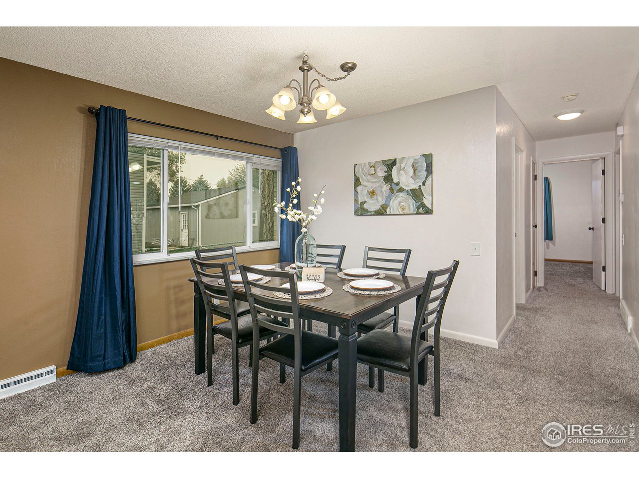 3415 West 5th St Road Greeley, CO 80634 - Photo 8 of 27 a view of a dining room with furniture window and outside view