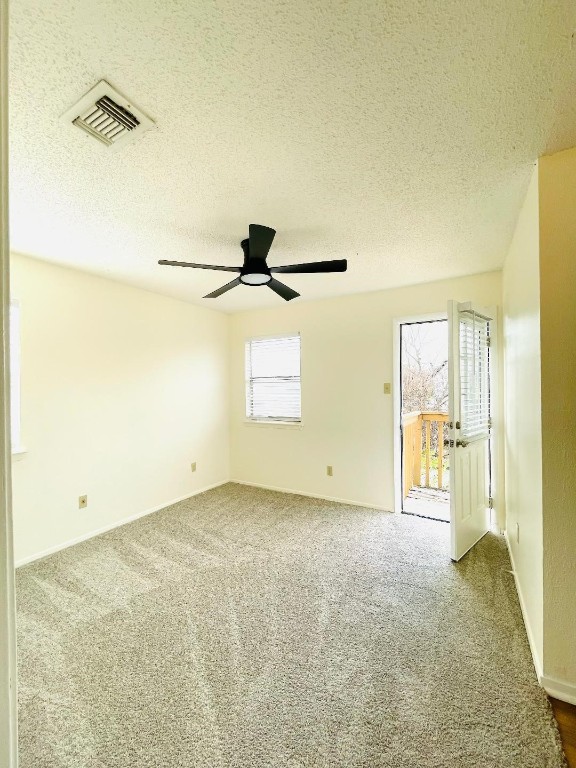 5608 Cougar Drive, Unit 203 Austin, TX 78745 - Photo 7 of 9 a view of an empty room