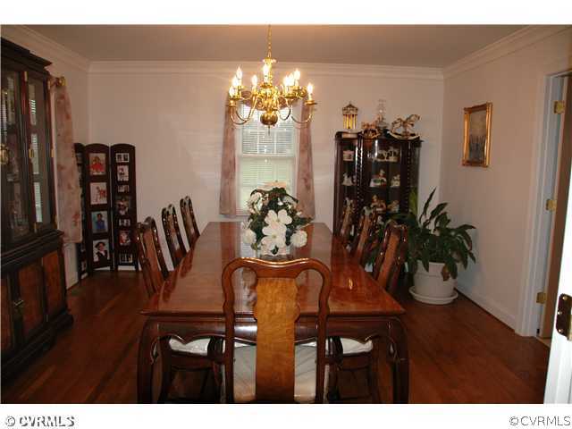 17363 Parsons Ridge Road Beaverdam, VA 23015 - Photo 3 of 12 a view of a dining room with furniture and chandelier