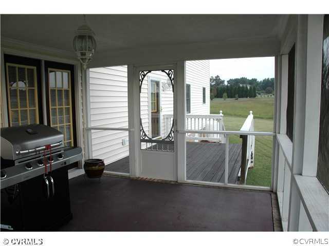17363 Parsons Ridge Road Beaverdam, VA 23015 - Photo 10 of 12 a view of a room with balcony and furniture
