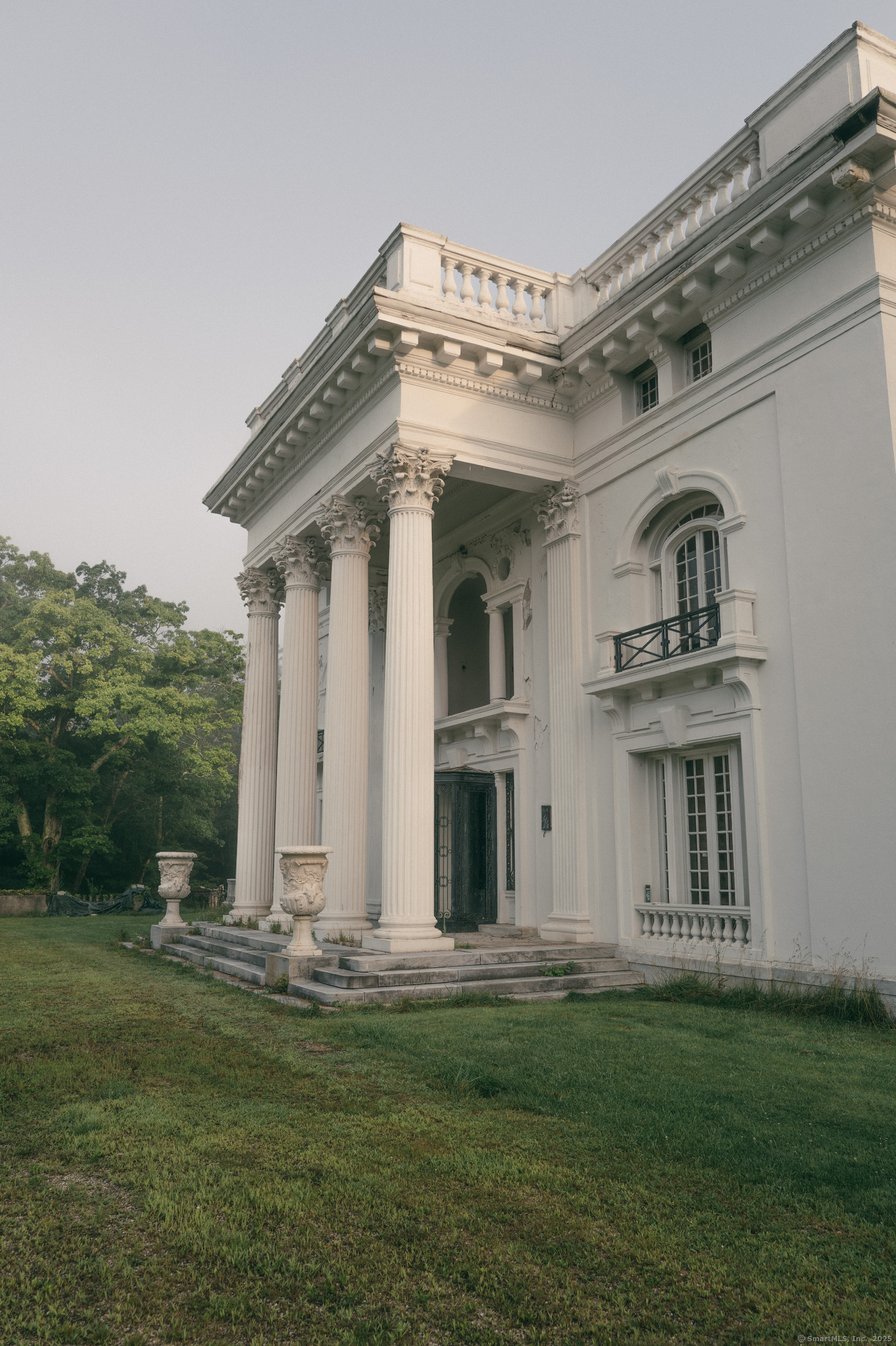 138 Amenia Road Sharon, CT 06069 - Photo 13 of 31 a front view of a house with a garden