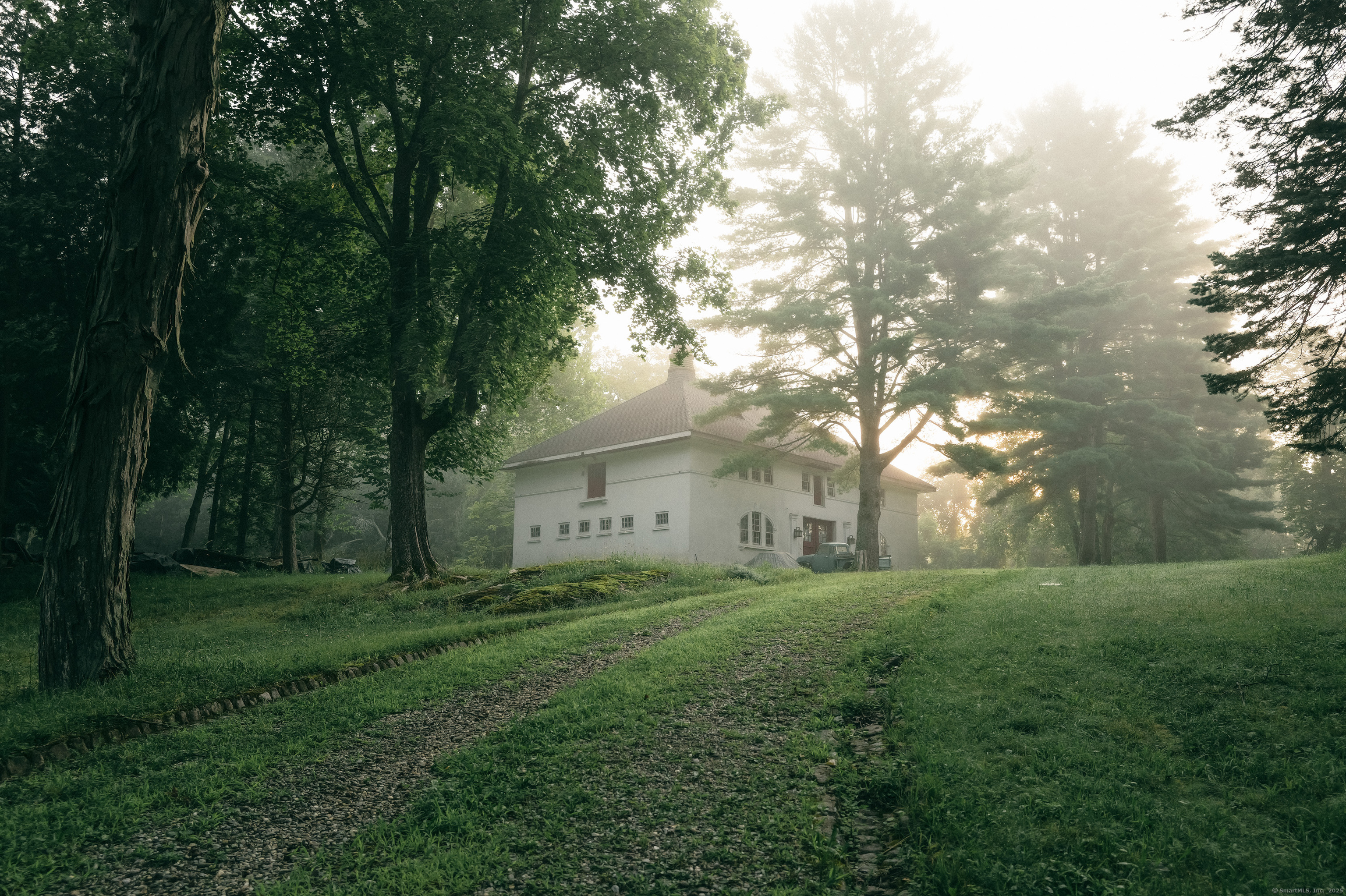 138 Amenia Road Sharon, CT 06069 - Photo 2 of 31 a big yard with large trees and a plants