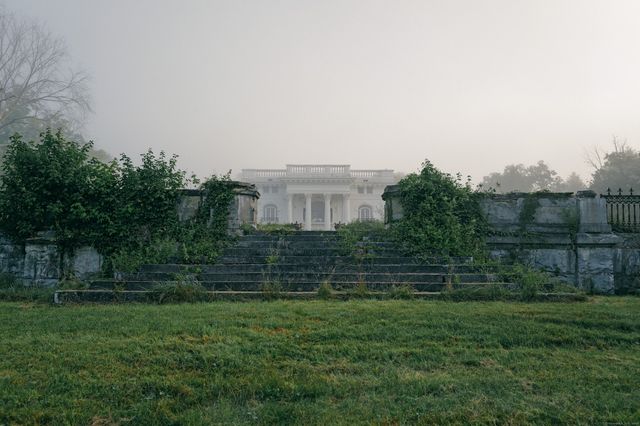 a backyard of a house with lots of green space
