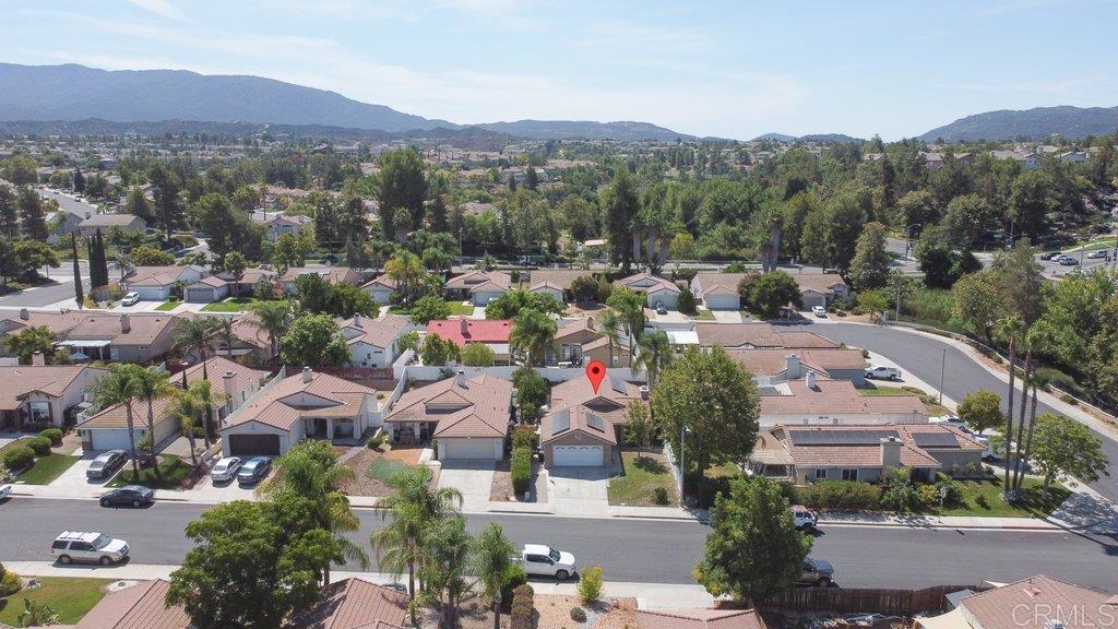 32467 Cervin Circle Temecula, CA 92592 - Photo 22 of 36 an aerial view of a city with lots of residential buildings