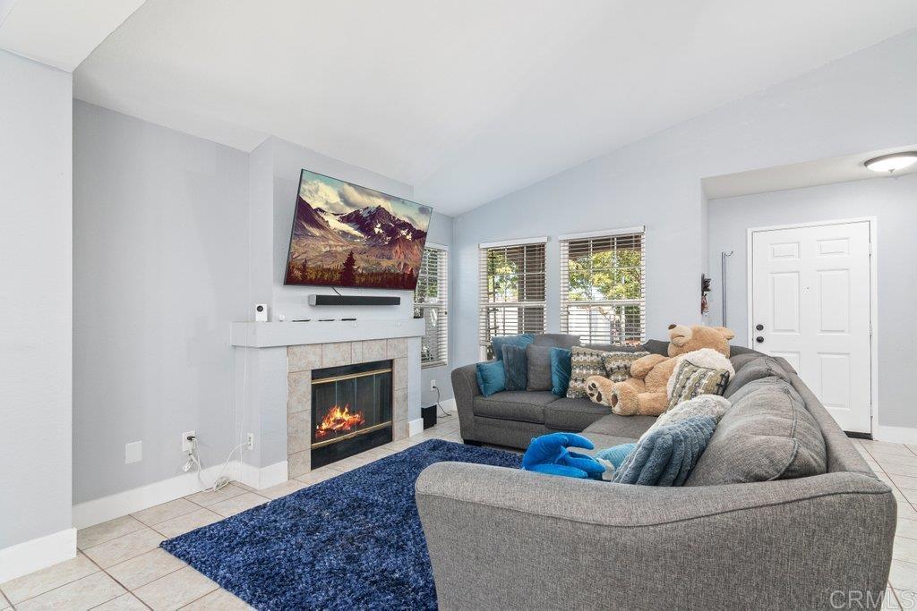 32467 Cervin Circle Temecula, CA 92592 - Photo 3 of 36 a living room with furniture and a fireplace