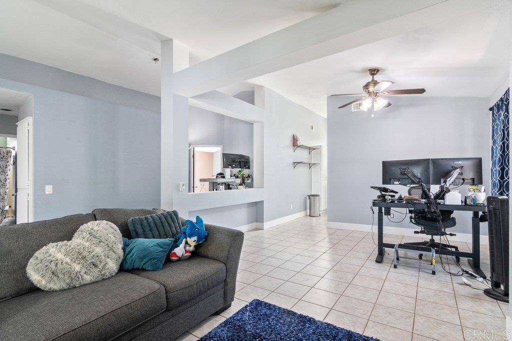 32467 Cervin Circle Temecula, CA 92592 - Photo 4 of 36 a living room with furniture and a chandelier