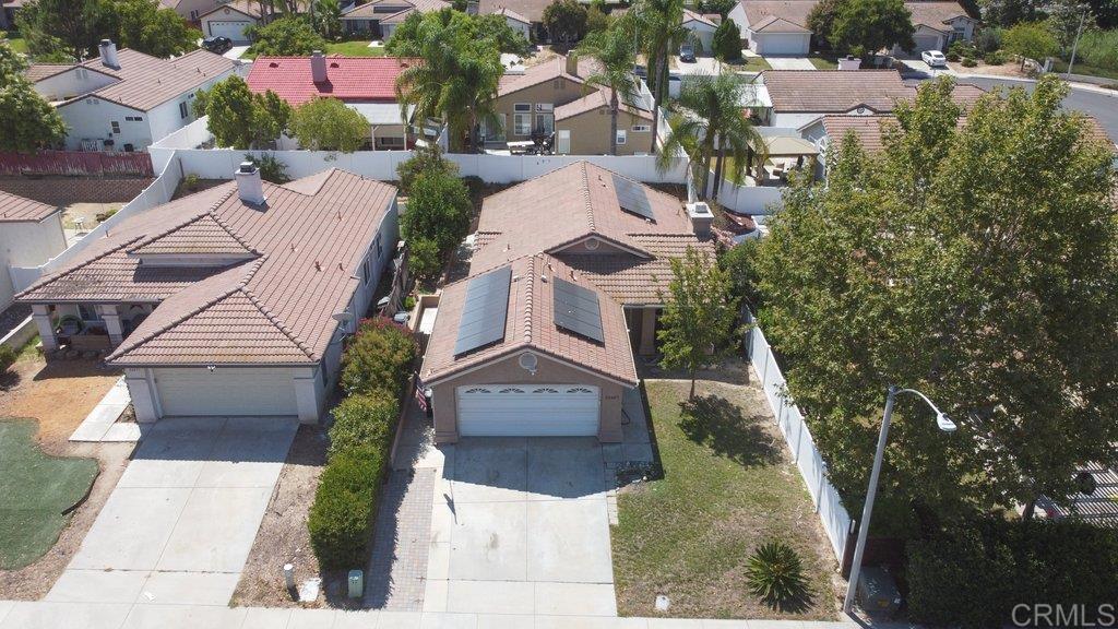 32467 Cervin Circle Temecula, CA 92592 - Photo 7 of 36 an aerial view of multiple houses with yard