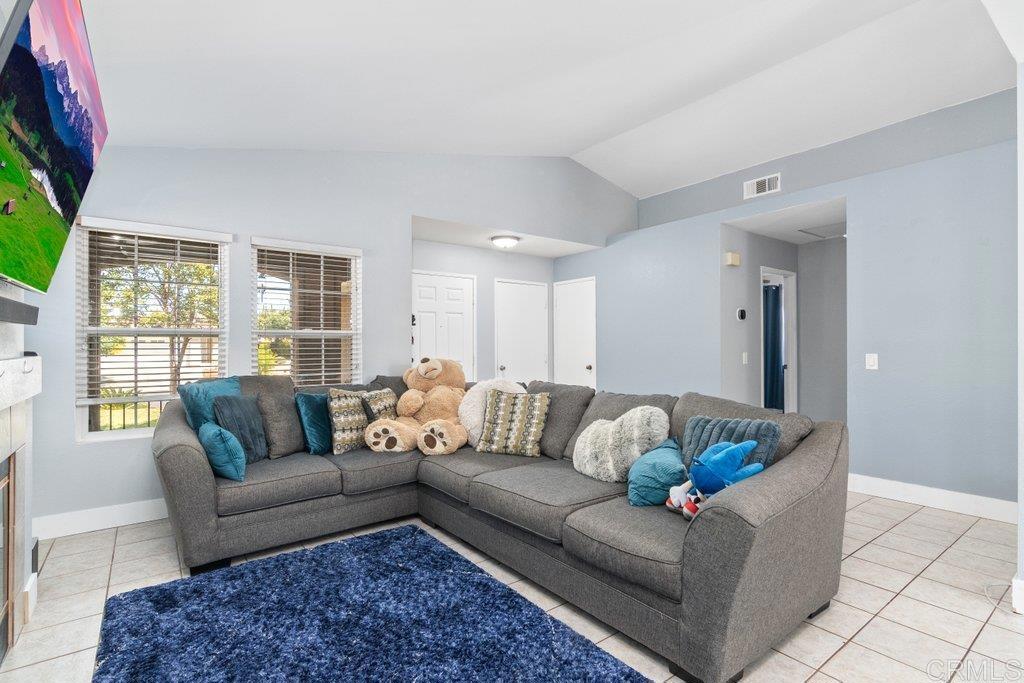 32467 Cervin Circle Temecula, CA 92592 - Photo 10 of 36 a living room with furniture and a large window