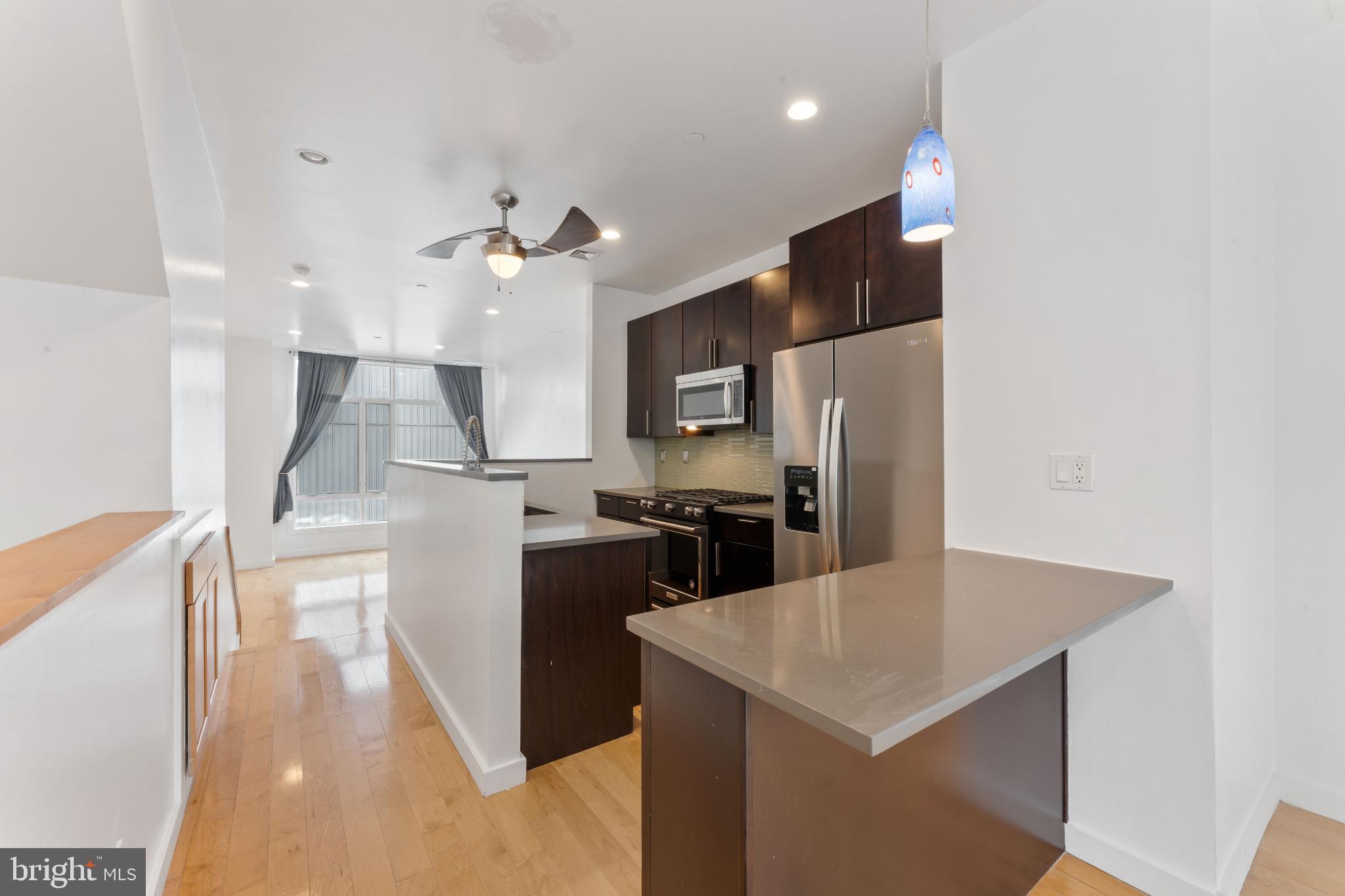333 Green Street, Unit 7 Philadelphia, PA 19123 - Photo 15 of 40 Modern kitchen with sleek finishes.