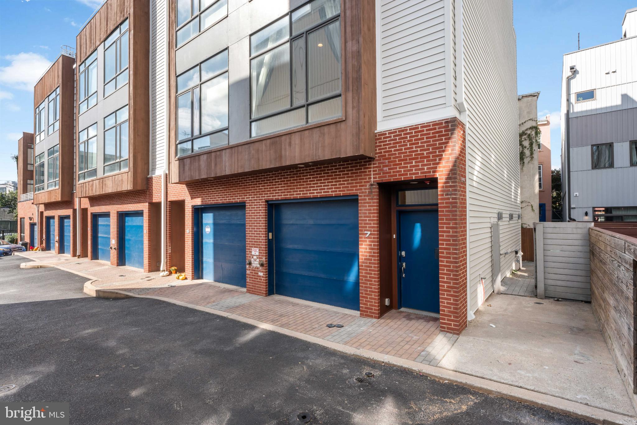333 Green Street, Unit 7 Philadelphia, PA 19123 - Photo 2 of 40 Modern townhomes with vibrant blue accents.