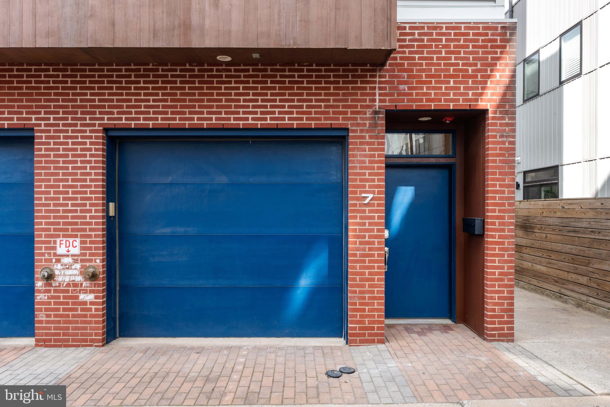 333 Green Street, Unit 7 Philadelphia, PA 19123 - Photo 3 of 40 Charming urban facade with bold blue accents.