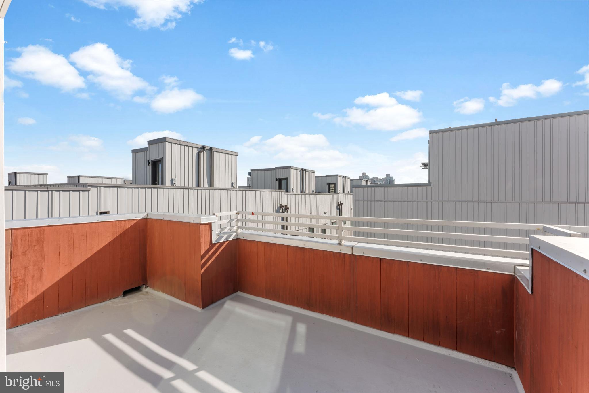 333 Green Street, Unit 7 Philadelphia, PA 19123 - Photo 37 of 40 Sunny rooftop retreat with urban views.