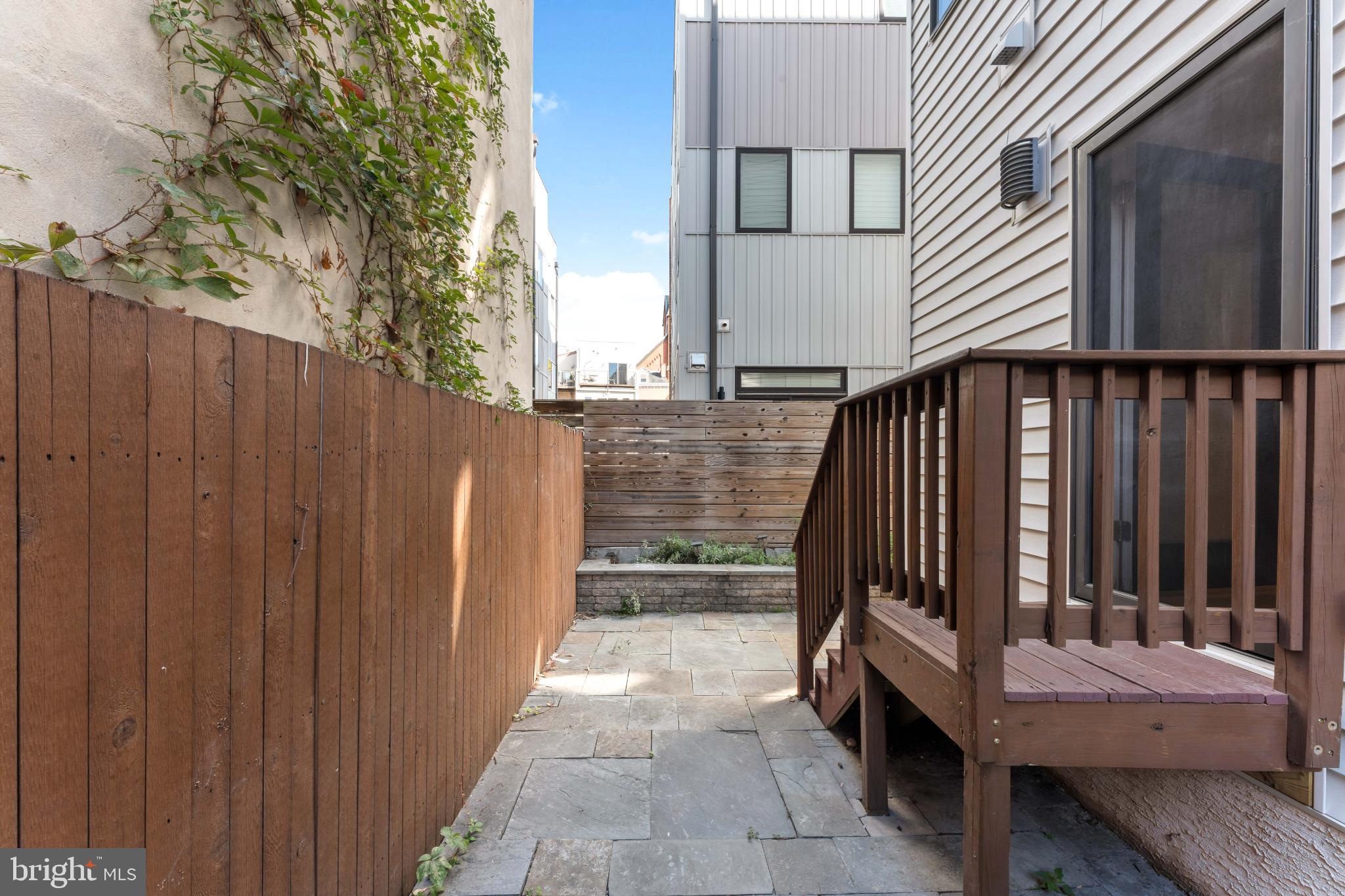 333 Green Street, Unit 7 Philadelphia, PA 19123 - Photo 40 of 40 Charming pathway to a serene outdoor retreat.