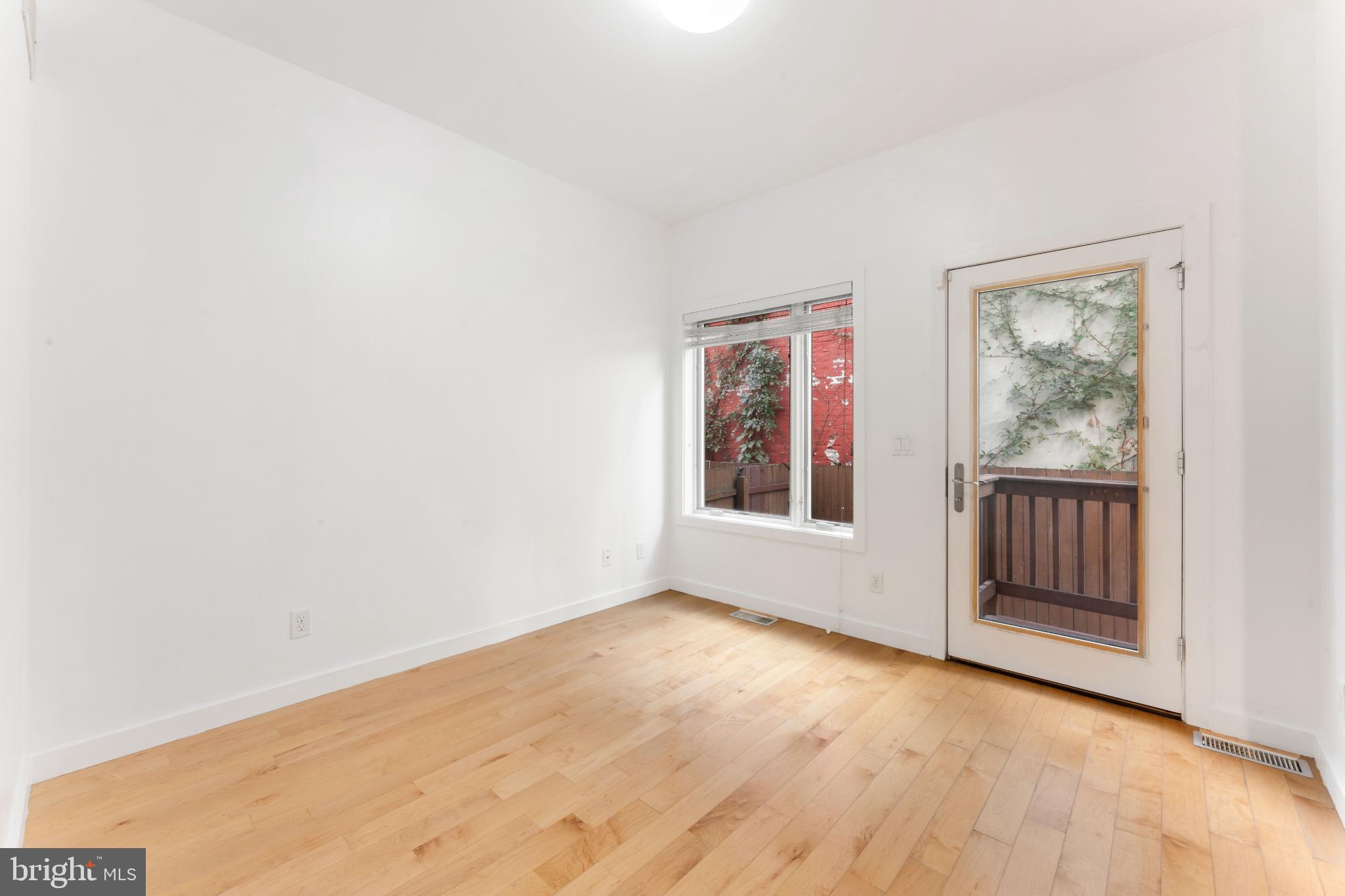 333 Green Street, Unit 7 Philadelphia, PA 19123 - Photo 6 of 40 Bright and airy space with outdoor access.