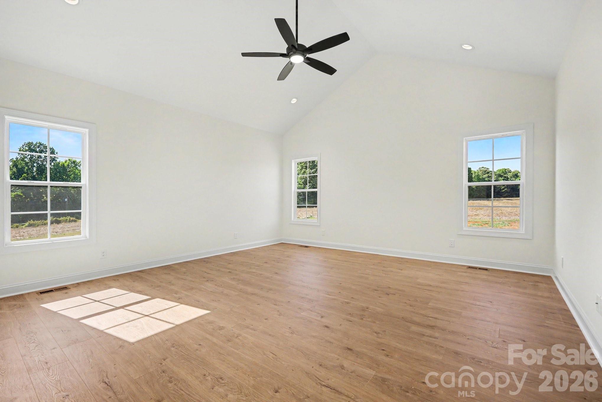 190 Goodnight Road Salisbury, NC 28147 - Photo 17 of 35 an empty room with window and a ceiling fan
