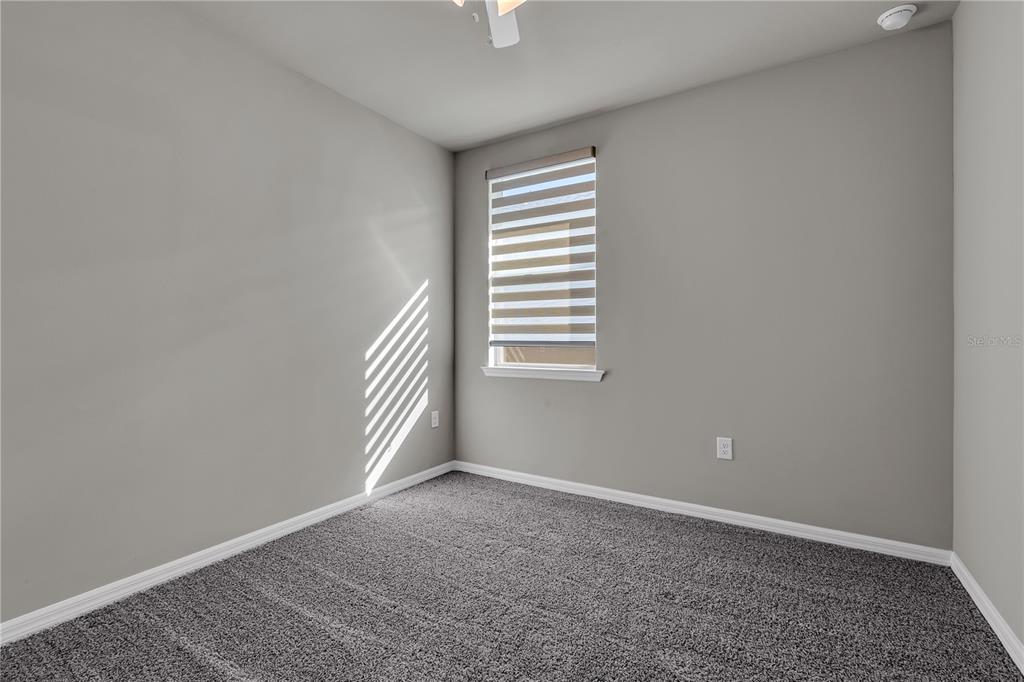 44254 Frontier Drive Punta Gorda, FL 33982 - Photo 11 of 48 a view of an empty room with a window