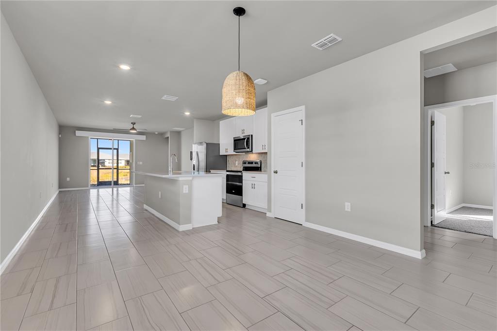 44254 Frontier Drive Punta Gorda, FL 33982 - Photo 6 of 48 a view of a kitchen with a sink and cabinets