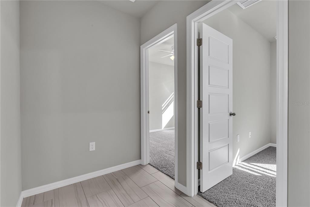 44254 Frontier Drive Punta Gorda, FL 33982 - Photo 9 of 48 a view of a bathroom with wooden floor