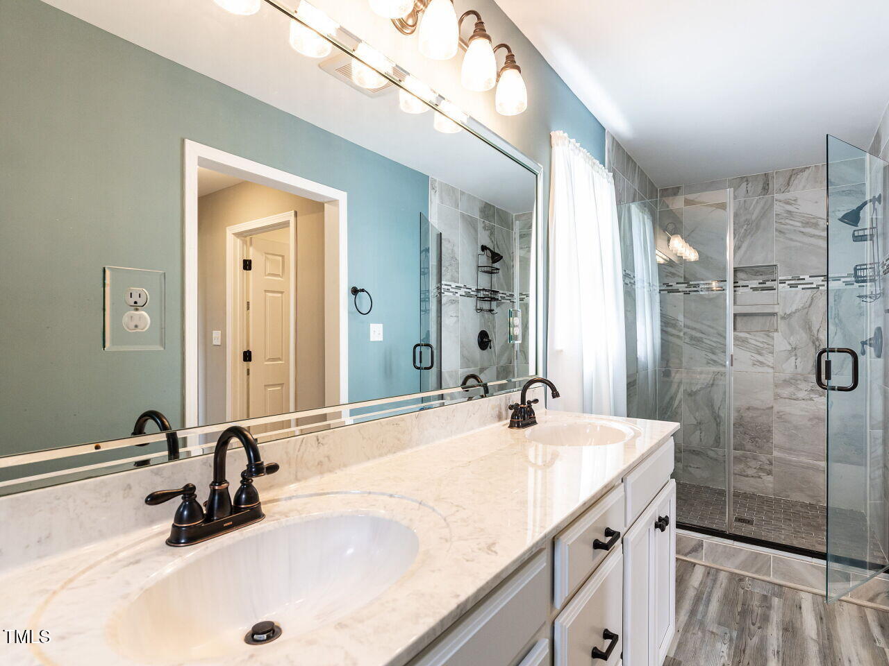 10336 Old Beulah Road Kenly, NC 27542 - Photo 26 of 71 a bathroom with a sink and a mirror