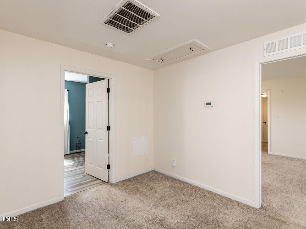 10336 Old Beulah Road Kenly, NC 27542 - Photo 28 of 71 a view of a livingroom with wooden cabinets