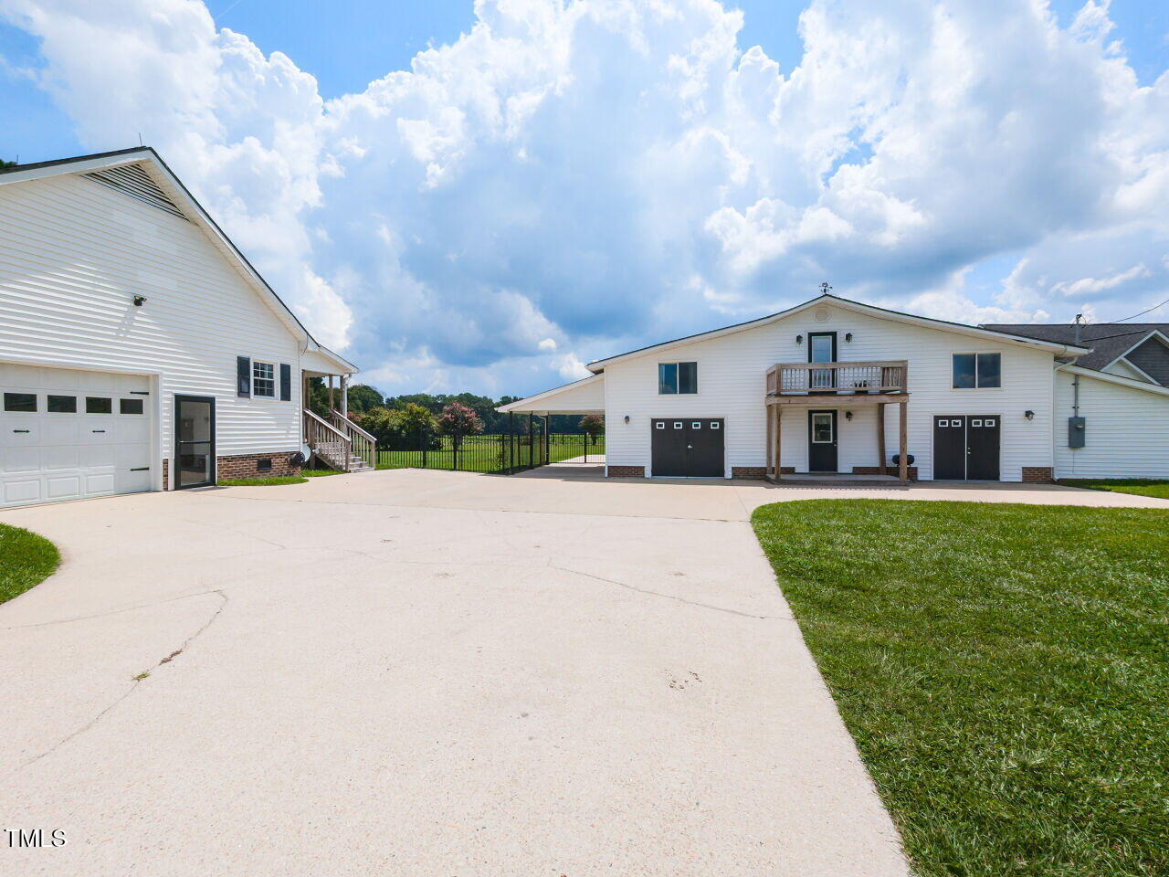 10336 Old Beulah Road Kenly, NC 27542 - Photo 42 of 71 a front view of a house with a yard