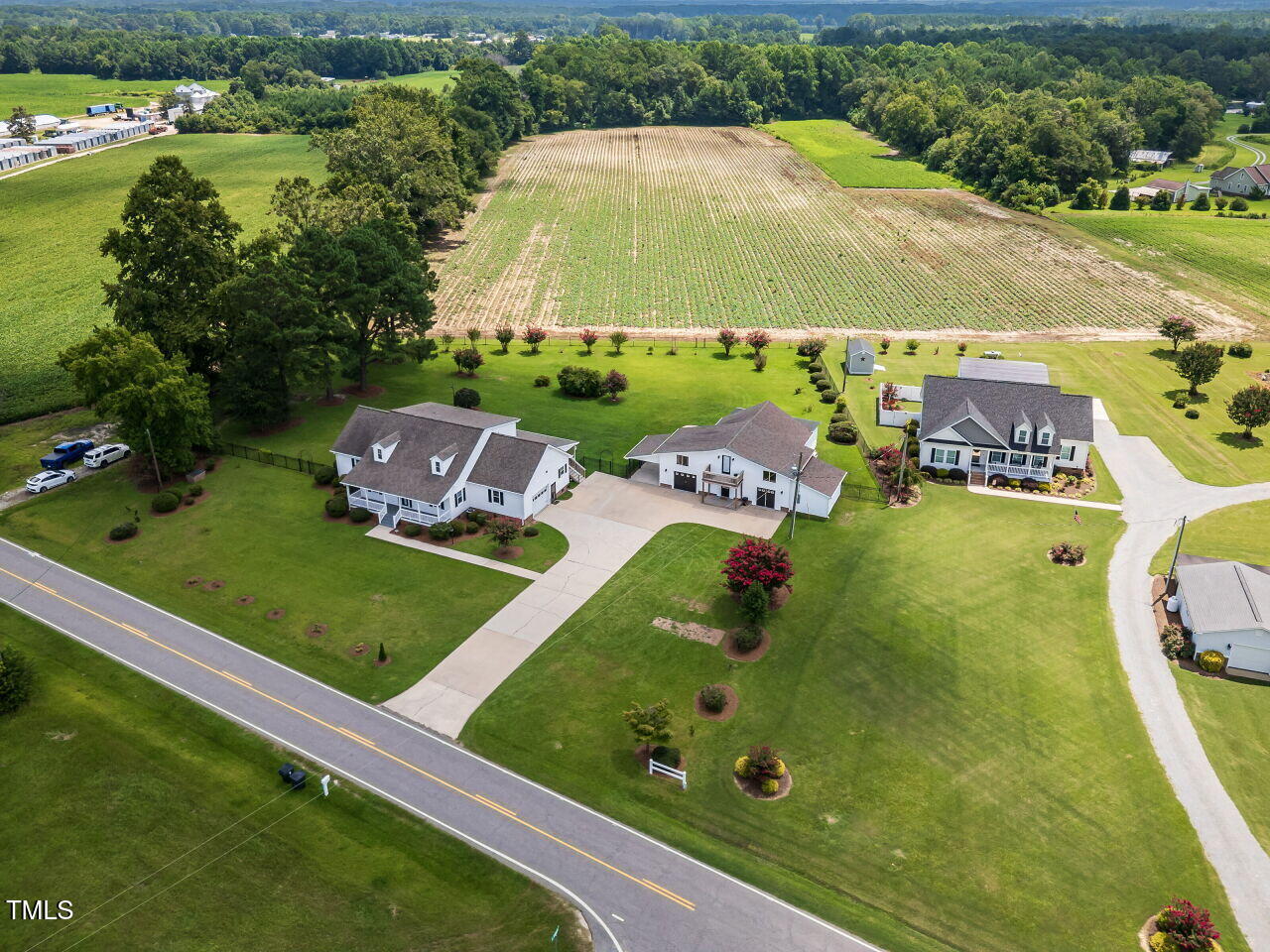 10336 Old Beulah Road Kenly, NC 27542 - Photo 5 of 71 a view of a pool with a garden