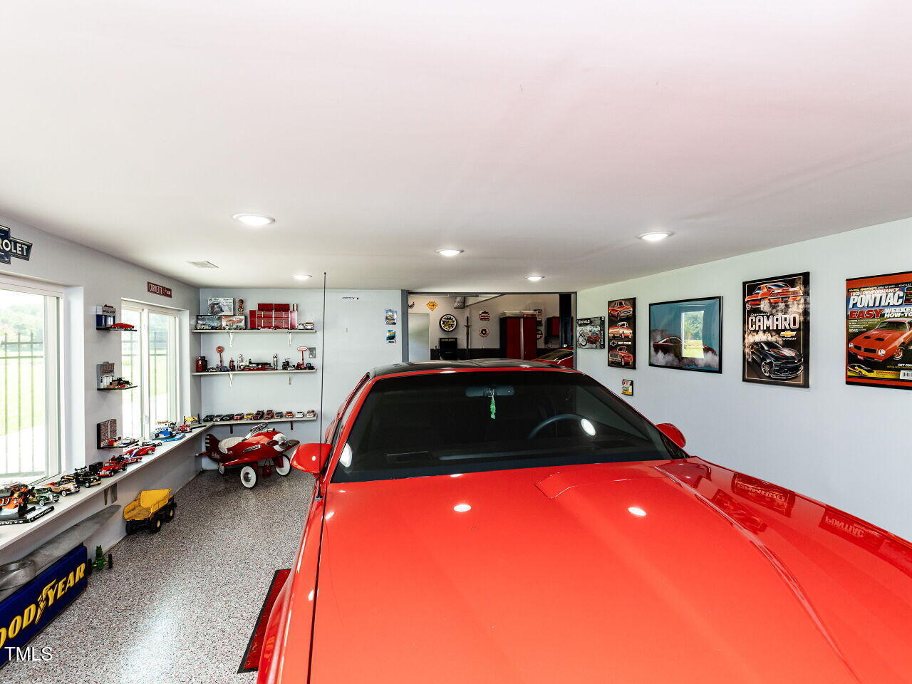 10336 Old Beulah Road Kenly, NC 27542 - Photo 52 of 71 a room with gym equipment and a large window