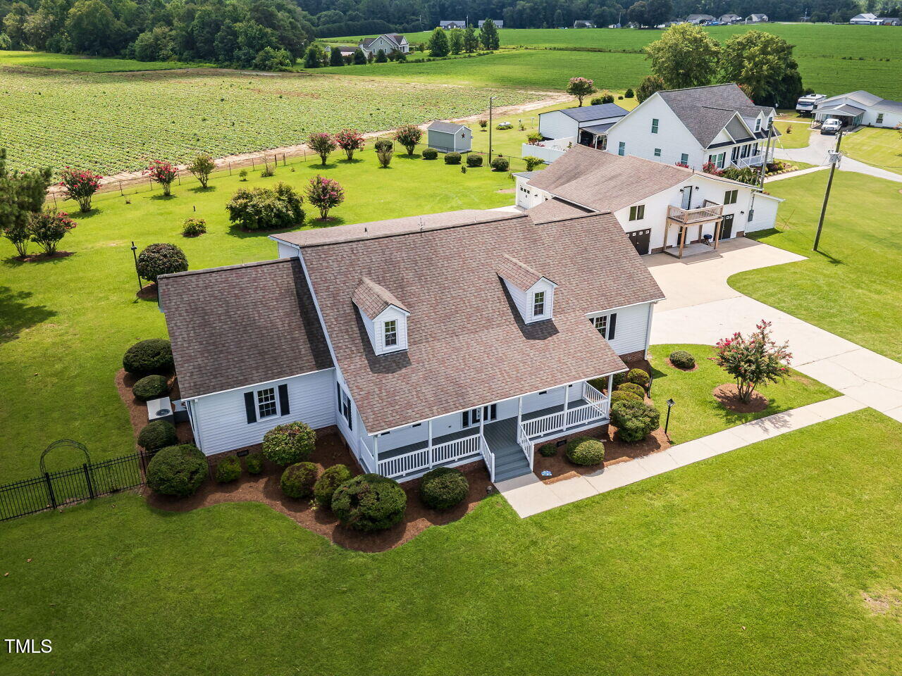 10336 Old Beulah Road Kenly, NC 27542 - Photo 62 of 71 an aerial view of a house with garden space and street view