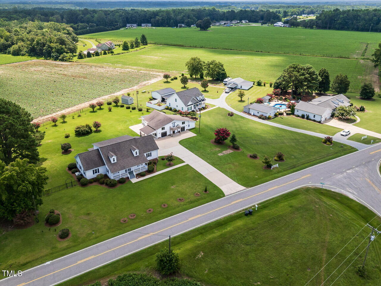 10336 Old Beulah Road Kenly, NC 27542 - Photo 65 of 71 an aerial view of a house with a garden