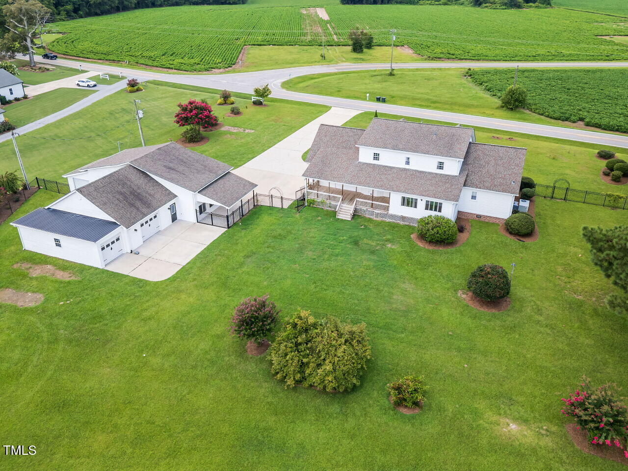 10336 Old Beulah Road Kenly, NC 27542 - Photo 70 of 71 an aerial view of a house with garden space and street view