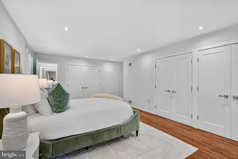 a bedroom with double bed and a window