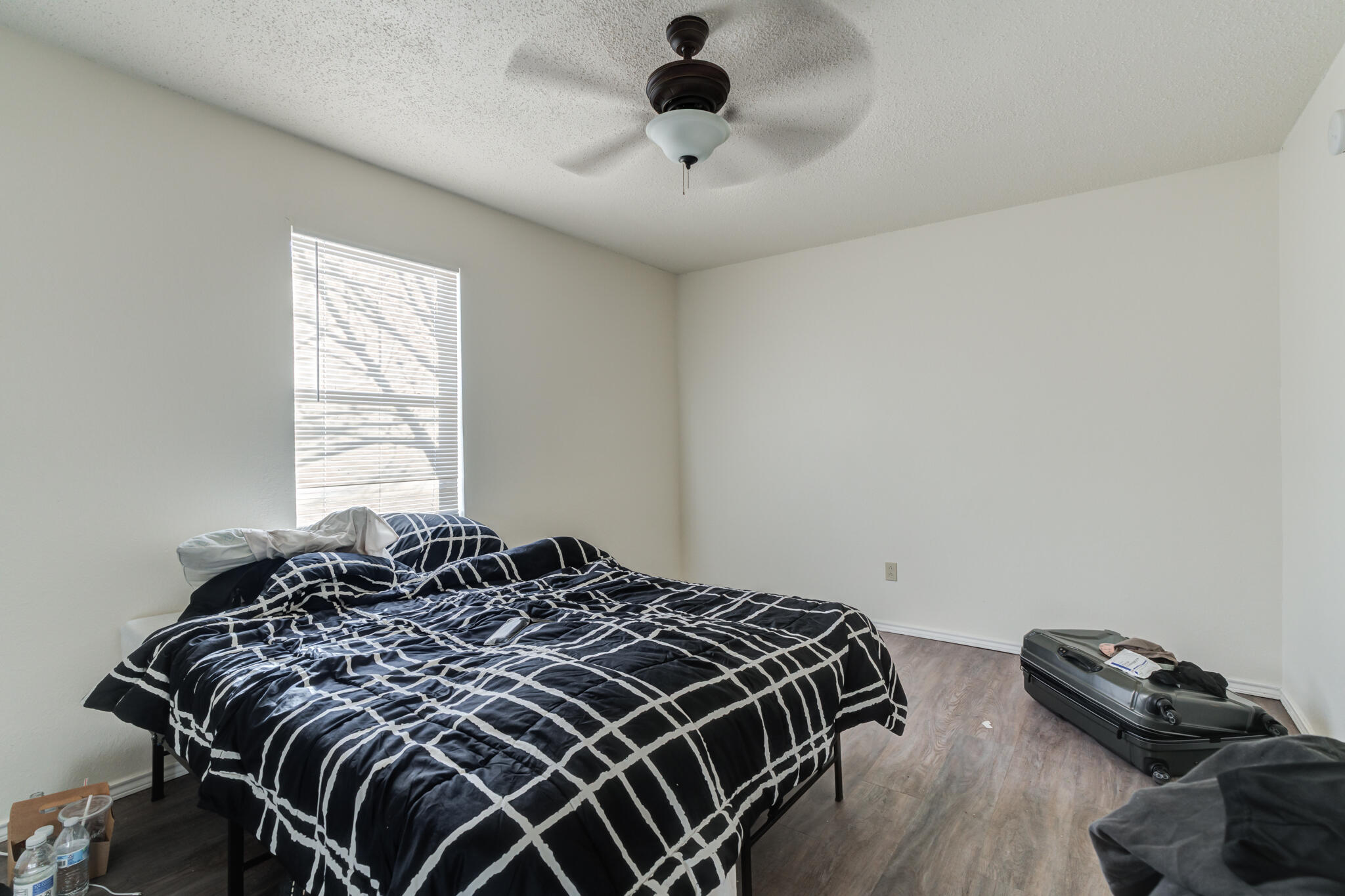 6210 22nd Street Lubbock, TX 79407 - Photo 13 of 18 a bedroom with a bed and a window
