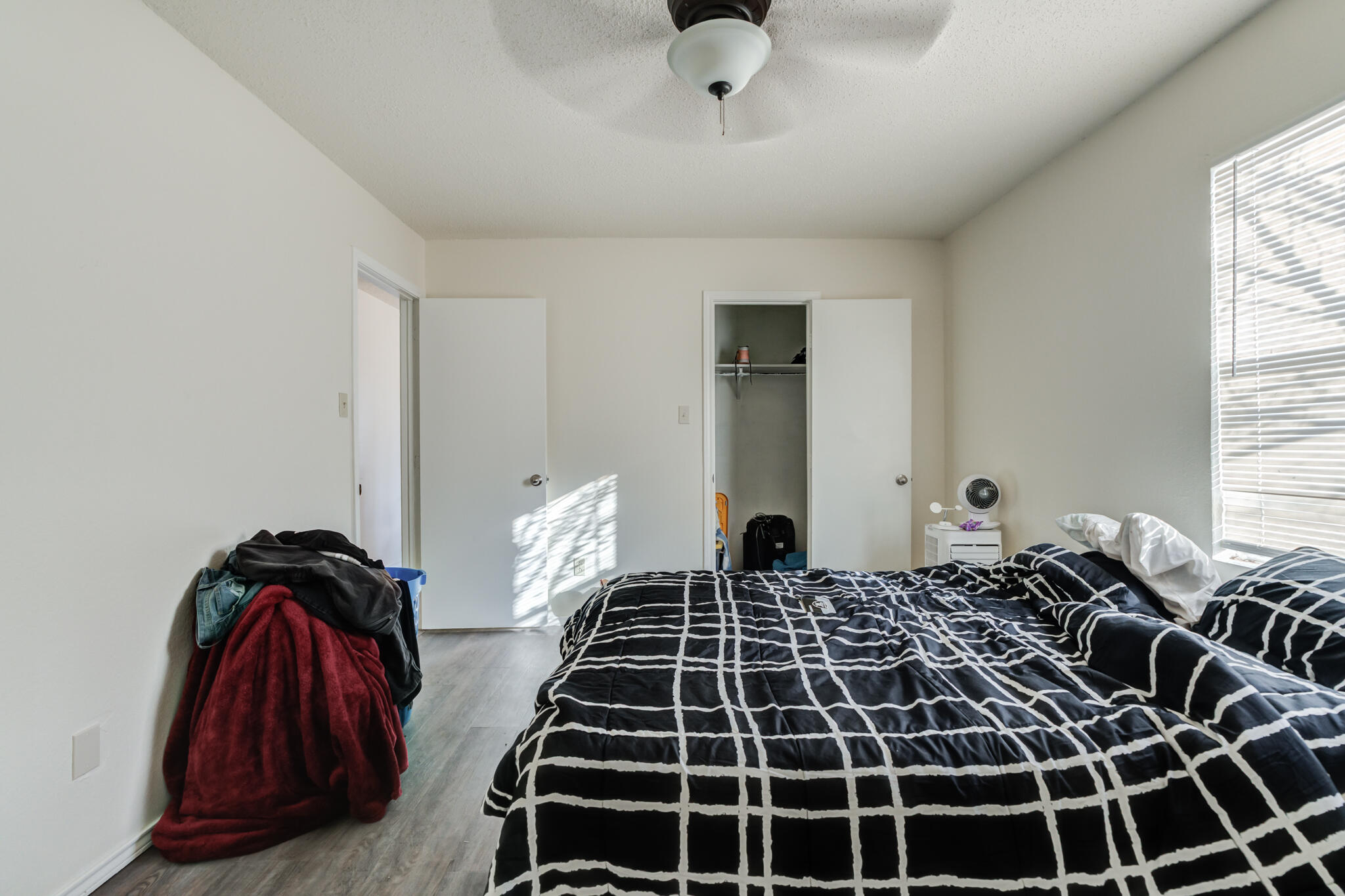 6210 22nd Street Lubbock, TX 79407 - Photo 14 of 18 a bedroom with a bed and a window