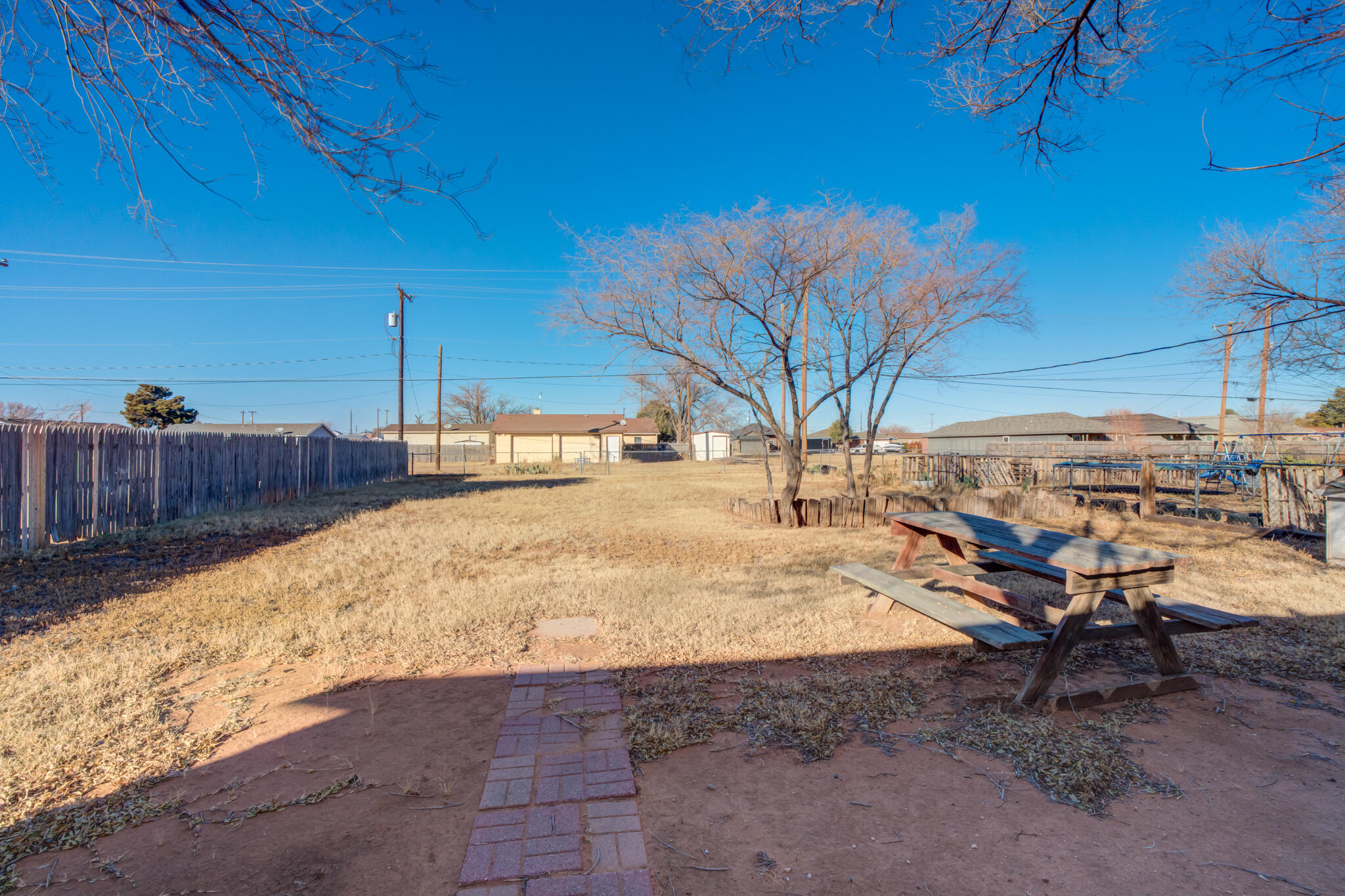 6210 22nd Street Lubbock, TX 79407 - Photo 18 of 18 a view of a backyard of the house