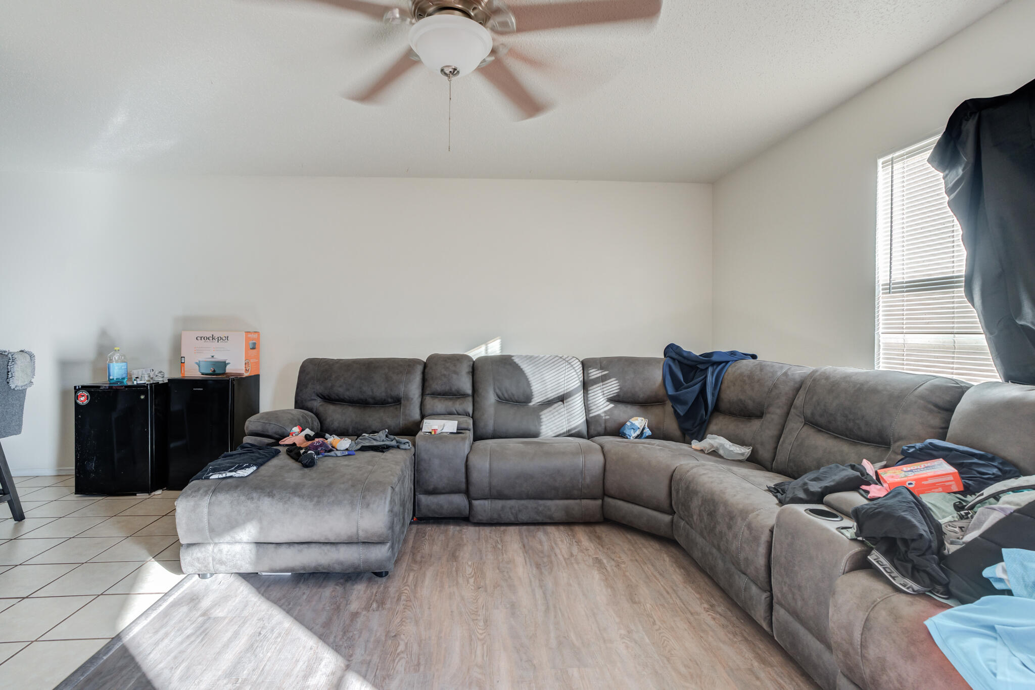 6210 22nd Street Lubbock, TX 79407 - Photo 5 of 18 a living room with furniture and a window