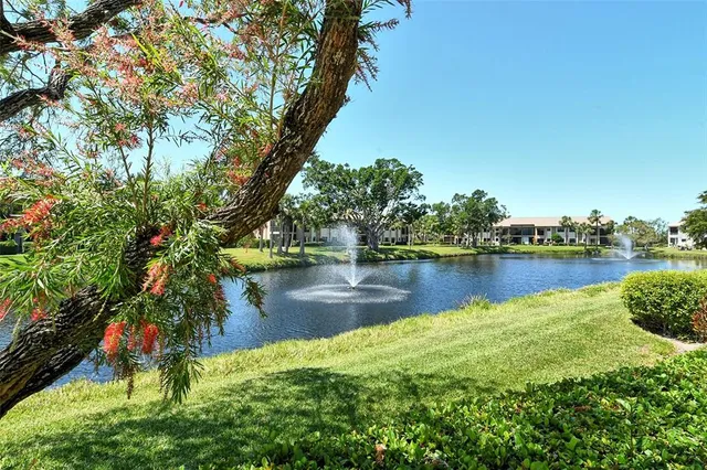a view of swimming pool with outdoor seating