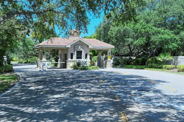 a backyard of a house with outdoor seating