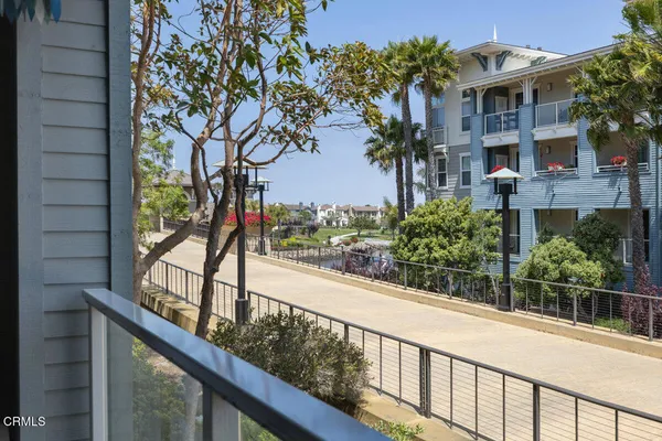 a view of a street from a balcony