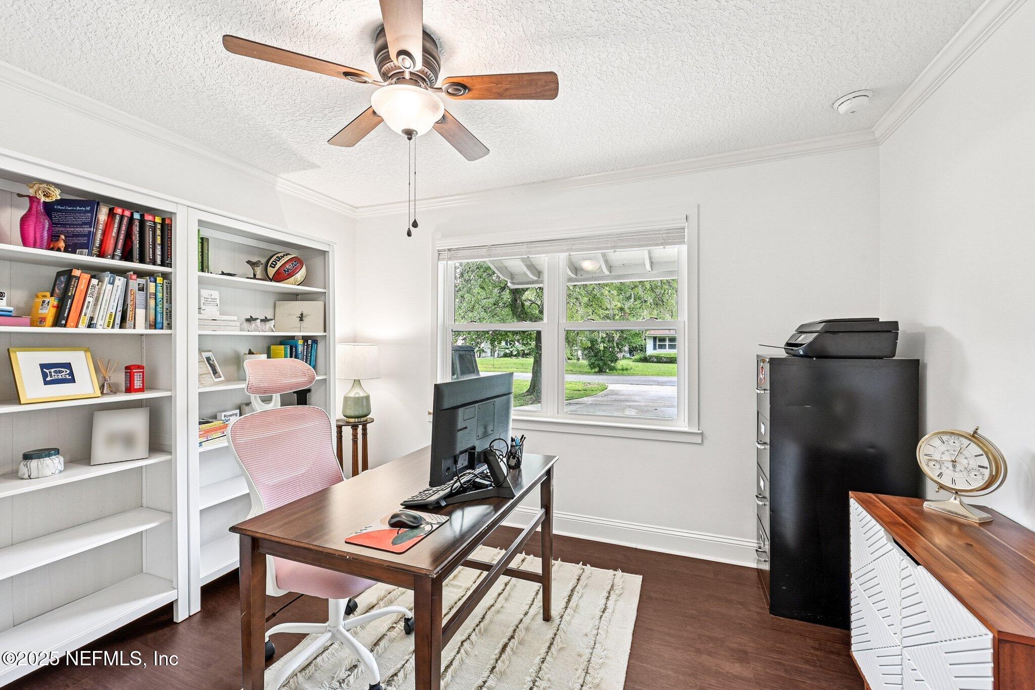 4637 Homestead Road Jacksonville, FL 32210 - Photo 17 of 43 a view of a workspace with furniture and a window