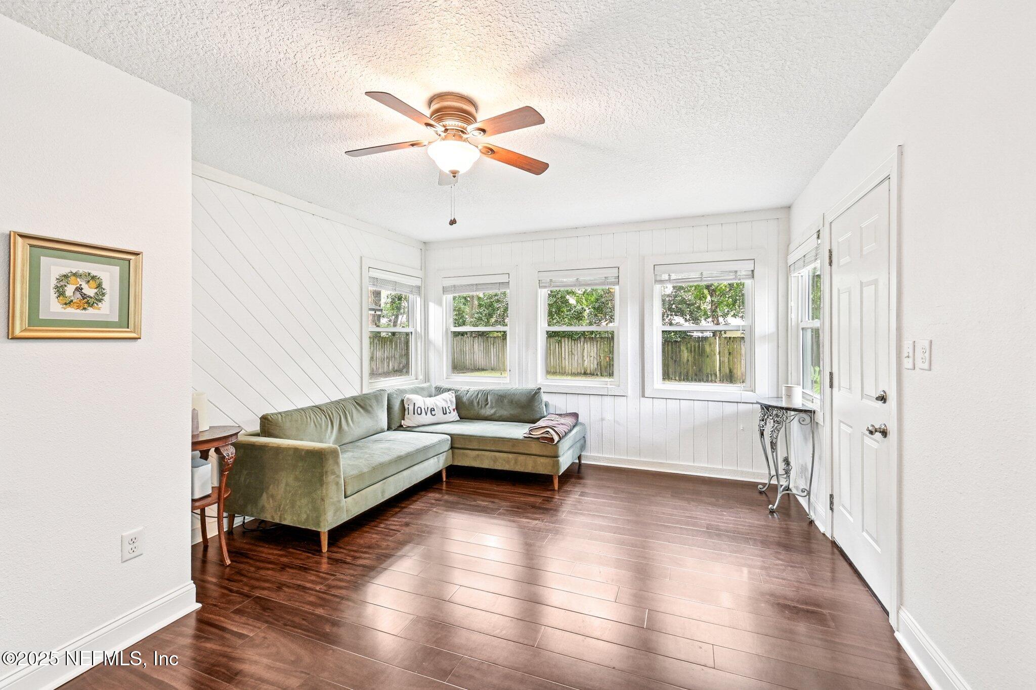 4637 Homestead Road Jacksonville, FL 32210 - Photo 20 of 43 a living room with furniture and a large window