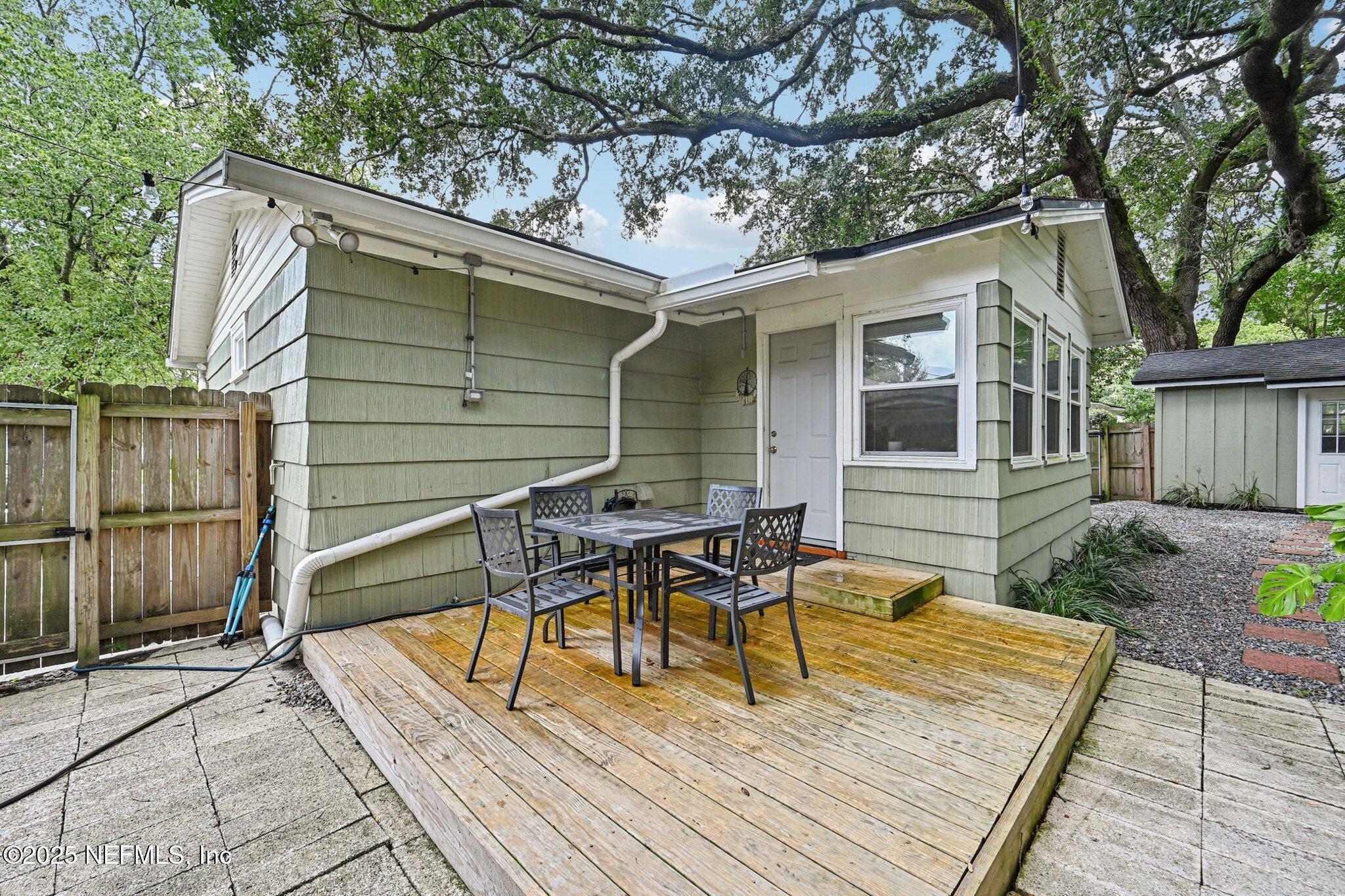 4637 Homestead Road Jacksonville, FL 32210 - Photo 28 of 43 a view of house with patio outdoor seating