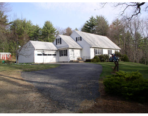a view of house with garden