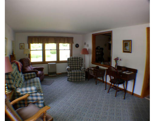 379 Town Farm Road Barre, MA 01005 - Photo 2 of 6 a living room with furniture and a window